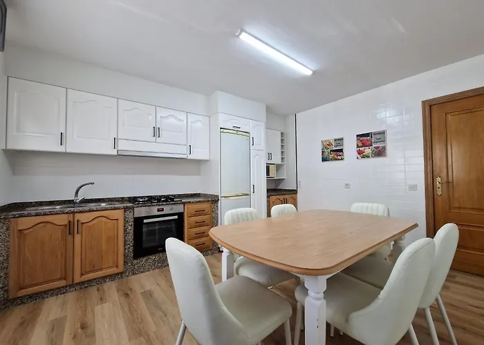 Acogedor En サンシェンショ